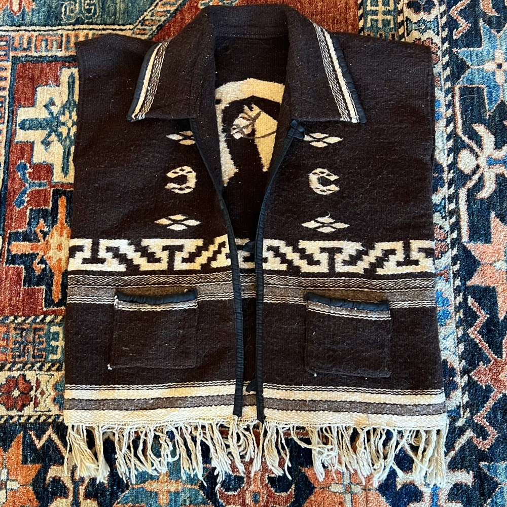 Amazing handmade wool blanket vest with pockets, a collar, and fringe